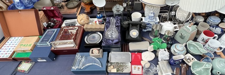 A bakelite telephone together with cufflinks, whistles, hip flask, Stuart crystal decanter,