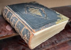 A leather bound welsh bible with brass corners and clasp