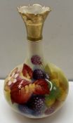 A Royal Worcester porcelain single stem vase painted with blackberries leaves and flowers,