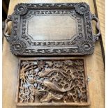 An anglo Indian carved twin handled tray together with a fish decorated wall plaque