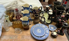 Wedgwood jasper plates together with pottery jugs, glass decanters,