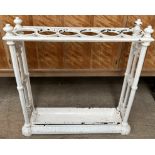 A cast iron six division stick stand,