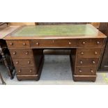 A Victorian oak pedestal desk, with a rectangular leather inset top and a central drawer,