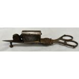 A 19th century steel wick trimmer and candle snuffers