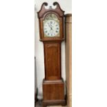A 19th century oak longcase clock, the hood with a broken swan neck pediment and columns,