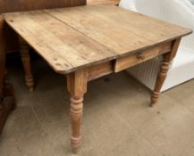 A Victorian pine scrub top dining table of square form,