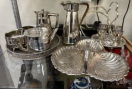 An Art Deco style electroplated four piece tea set together with other electroplated items