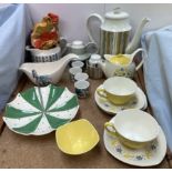A collection of mid winter pottery including a coffee pot,