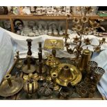 A gilt metal candelabra with flowerheads and leaves together with crowns, brass candlesticks,