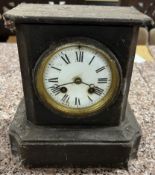 A black slate mantle clock,