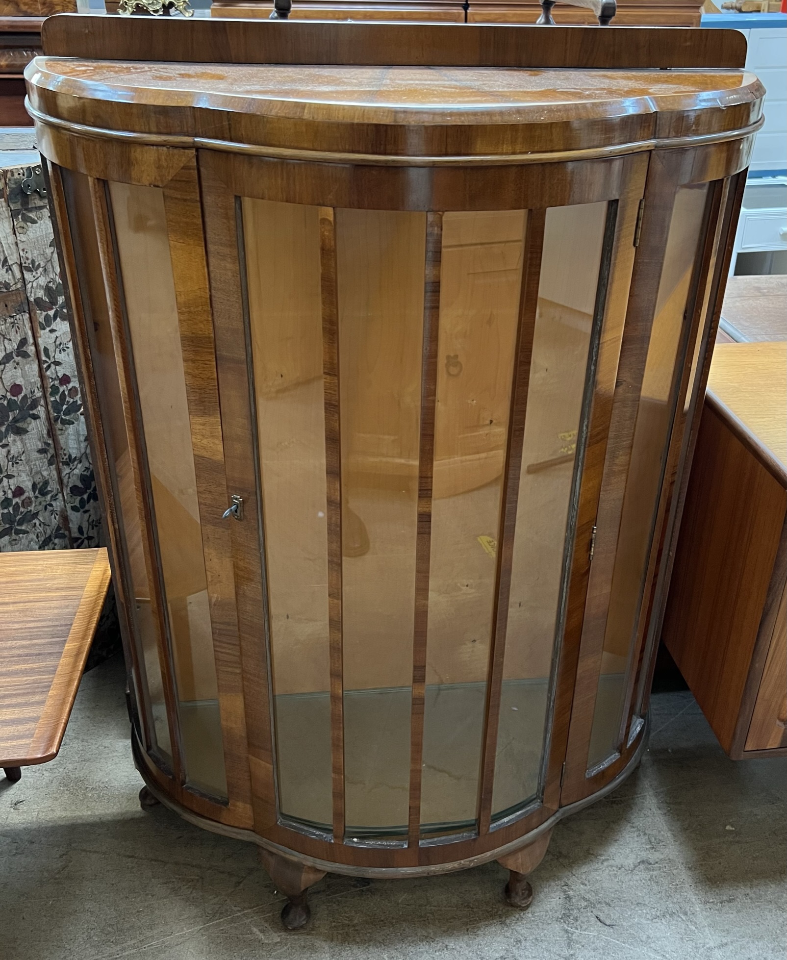 A 20th century walnut display cabinet,