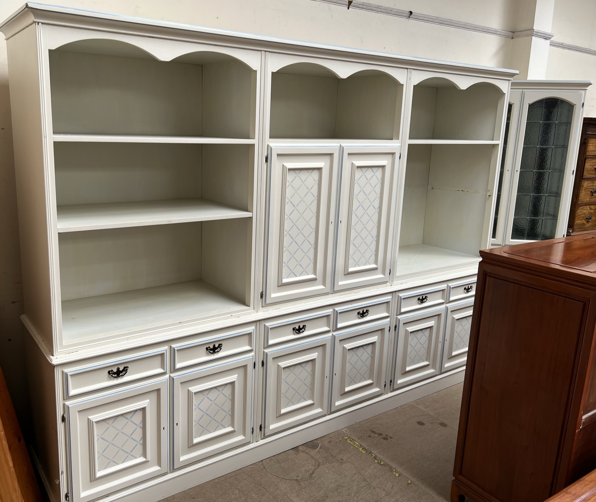 A modern wall unit / bookcase in three sections with cupboards, drawers and shelves, - Image 2 of 3