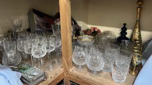 A large collection of crystal drinking glasses together with a liquer set etc