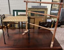 A mid 20th century caned stool with metal sides together with a towel rail