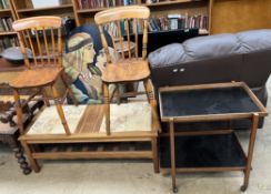 A mid 20th century tiled top coffee table together with a pair of kitchen chairs,