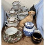 A Poole pottery dolphin together with a melba ware Labrador, USSR part tea set,