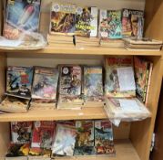 A large collection of comics including Classics illustrated, Lion, War Picture Library, Commando,