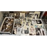 A large collection of world coins together with assorted photographs and postcards etc