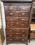 An 18th century oak chest on chest,