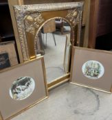 A rectangular gilt mirror decorated with leaves with an oval plate together with two framed Punch