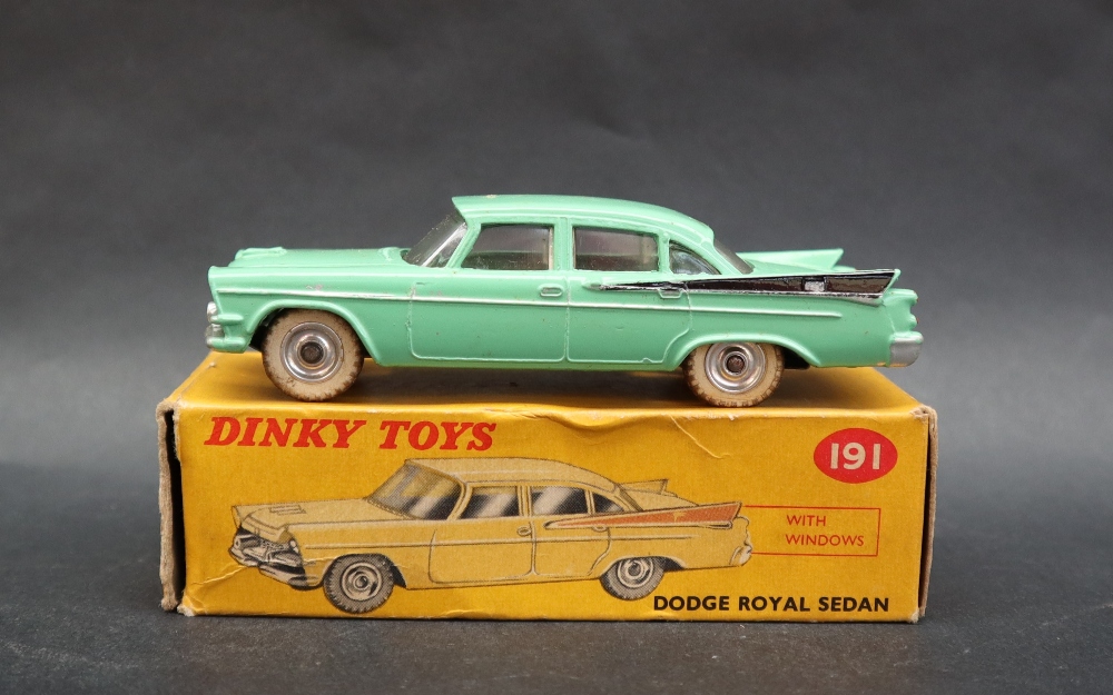 A Dinky Toys 191 Dodge Royal Sedan in pale green with black flash, spun hubs,