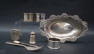 A Victorian silver pin tray of oval form decorated with scrolls and leaves, Birmingham, 1899,