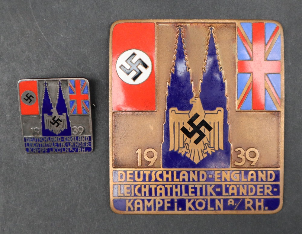 An enamelled bronze plaque depicting the Nazi Party Flag and the Union Flag flanking blue enamel - Image 2 of 4