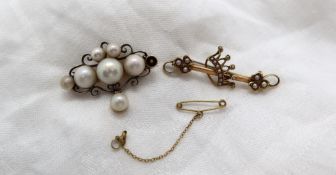 An Edwardian pearl set brooch,