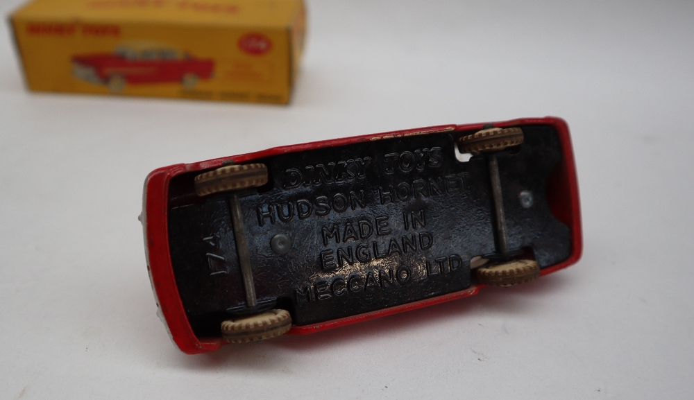 A Dinky Toys 174 Hudson Hornet Sedan with red lower body, cream roof, flash and hubs, - Image 4 of 4