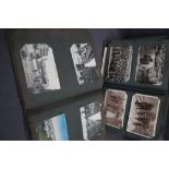 Two postcard albums comprising war related postcards, architecture, travel, comic, photographs,