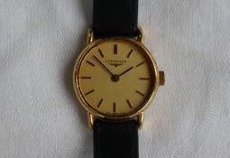 A lady's gold plated Longines wristwatch,