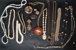 Assorted costume jewellery including beaded necklaces,