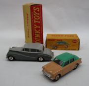 A Dinky Toys 150 Rolls Royce Silver Wraith in two tone grey, with windows,