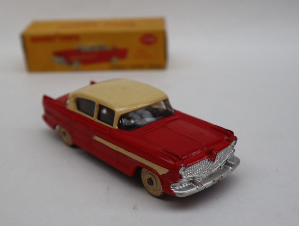 A Dinky Toys 174 Hudson Hornet Sedan with red lower body, cream roof, flash and hubs, - Image 3 of 4