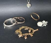 Various 9ct gold charms on a gold plated bracelet together with a 9ct gold christening bracelet