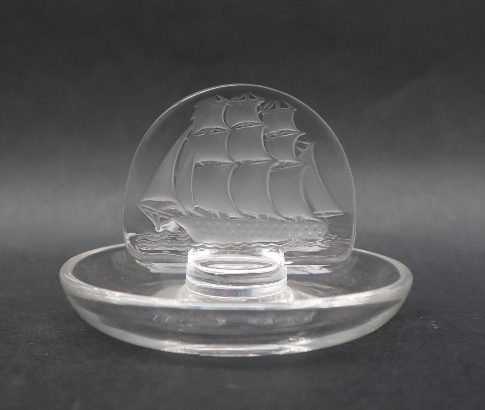 A Lalique pin tray, the oval panel decorated with a three masted ship, marked Lalique, France, 9.