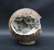 Studio Pottery - An orb with an opening with a glazed geometric and wave interior,