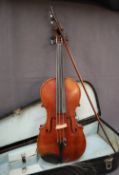 A violin with a one piece back and ebony stringing, bears a label for Louis Noebe, Homborg,