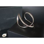 A Georg Jensen silver infinity bangle No 452A,