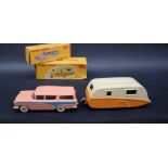 A Dinky Toys 173 Nash Rambler with windows in pink with blue flash and cream hubs in correct colour