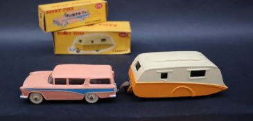 A Dinky Toys 173 Nash Rambler with windows in pink with blue flash and cream hubs in correct colour