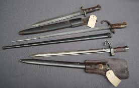 A 19th century French Gras bayonet, the 52cm blade inscribed Mre d'armes de Chat et fevrier 1876,