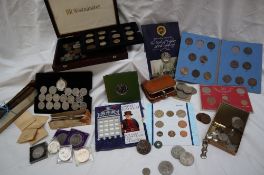 A collection of coins including a 1994 Brilliant uncirculated coin collection,