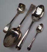 A William IV silver table spoon, London, 1830 together with three other silver spoons,