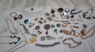 Assorted costume jewellery including necklaces, brooches, ring,