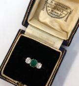 An Emerald and diamond ring,