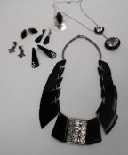An Art Deco style black bakelite and paste set necklet together with a pendant,