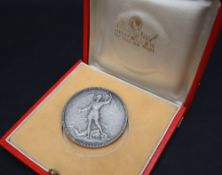 A Belgian white medal medallion "Championnats D'Europe D'athletisme Bruxelles 1950" the other side