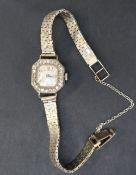 A lady's platinum hexagonal shaped Orator dress watch set with twenty four round old cut diamonds,