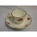 A Swansea porcelain teacup and saucer decorated with roses, London shape,